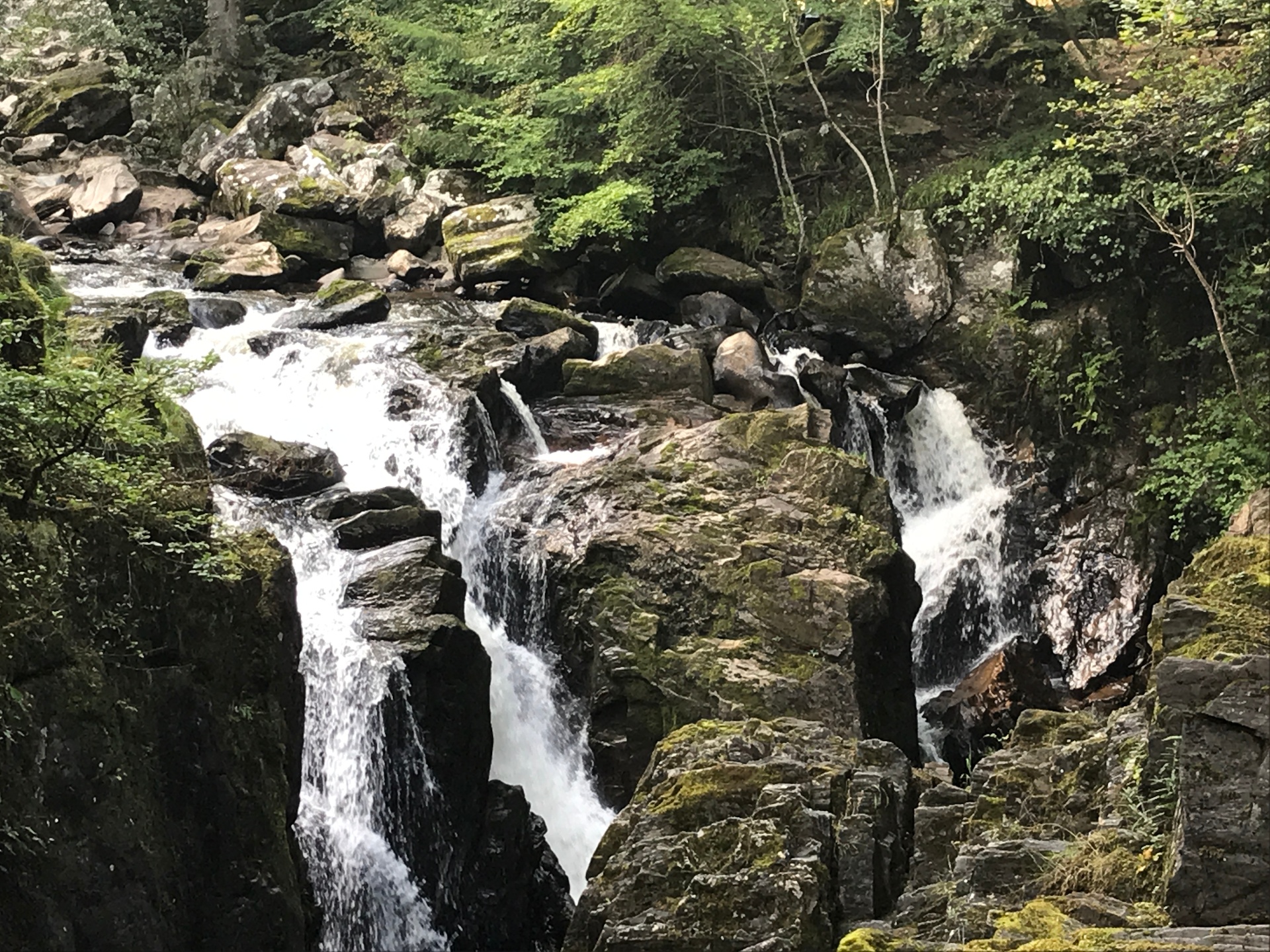 Sacred waters cascading through ancient stones in Argyll
